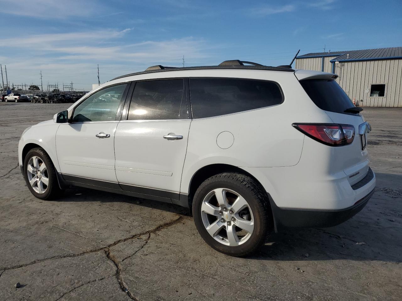 2017 Chevrolet Traverse VIN 1GNKRGKD4HJ100719 Copart auction photo, side damage thumbnail 2
