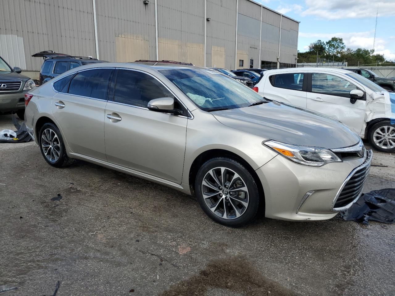 2017 Toyota Avalon VIN 4T1BK1EB1HU255100 Copart auction photo, all over damage thumbnail 4