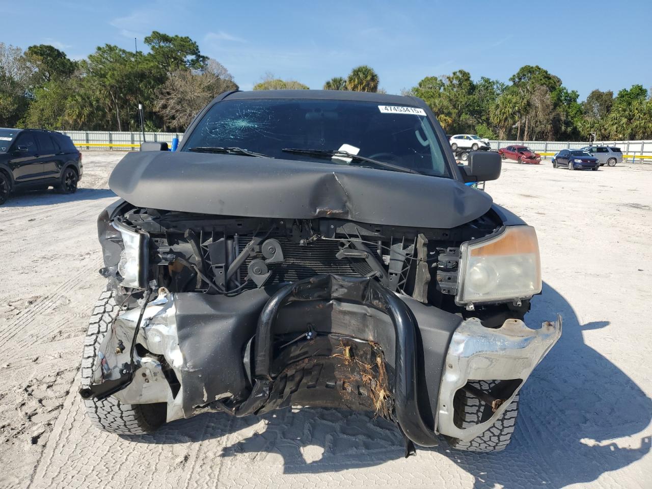 2010 Nissan Titan VIN 1N6AA0CJ7AN317846 Copart auction photo, front end / side damage thumbnail 5