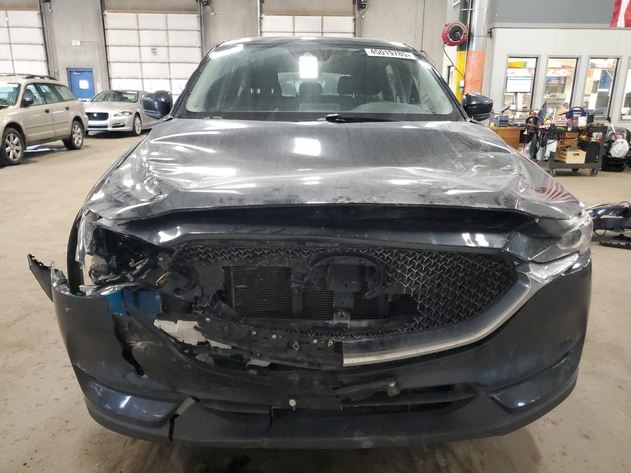 2020 Mazda CX-5 VIN JM3KFBBM5L0828480 Copart auction photo, front end damage thumbnail 5