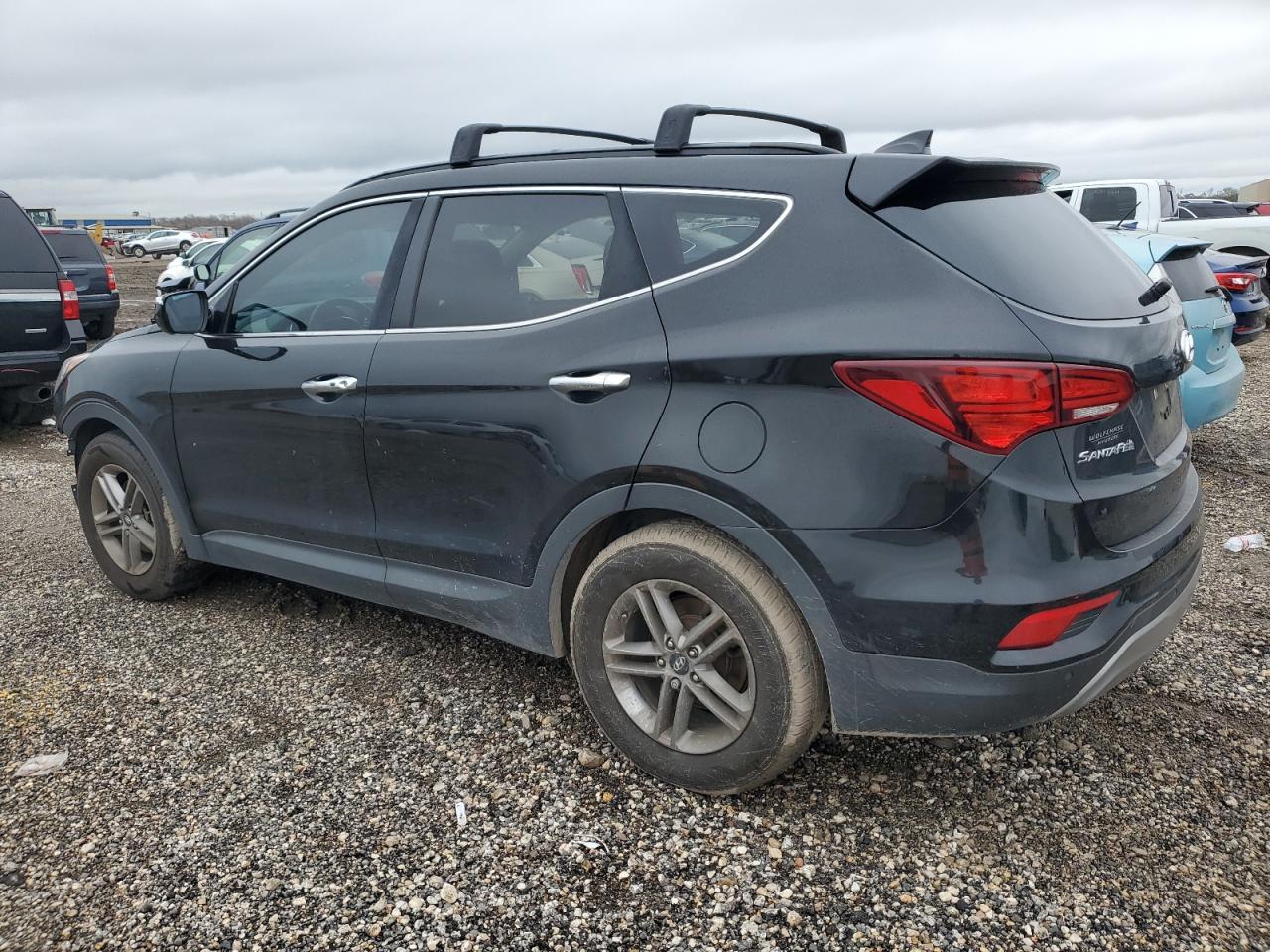 2017 Hyundai Santa Fe VIN 5XYZU3LB3HG415622 Copart auction photo, front end / side damage thumbnail 2