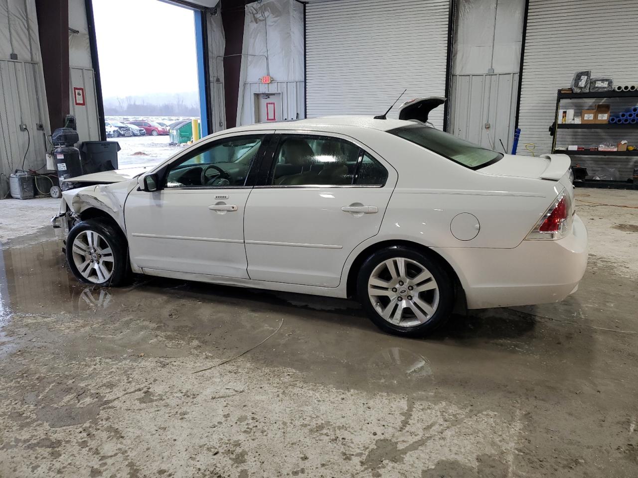 2009 Ford Fusion VIN 3FAHP08Z49R115852 Copart auction photo, front end / side damage thumbnail 2