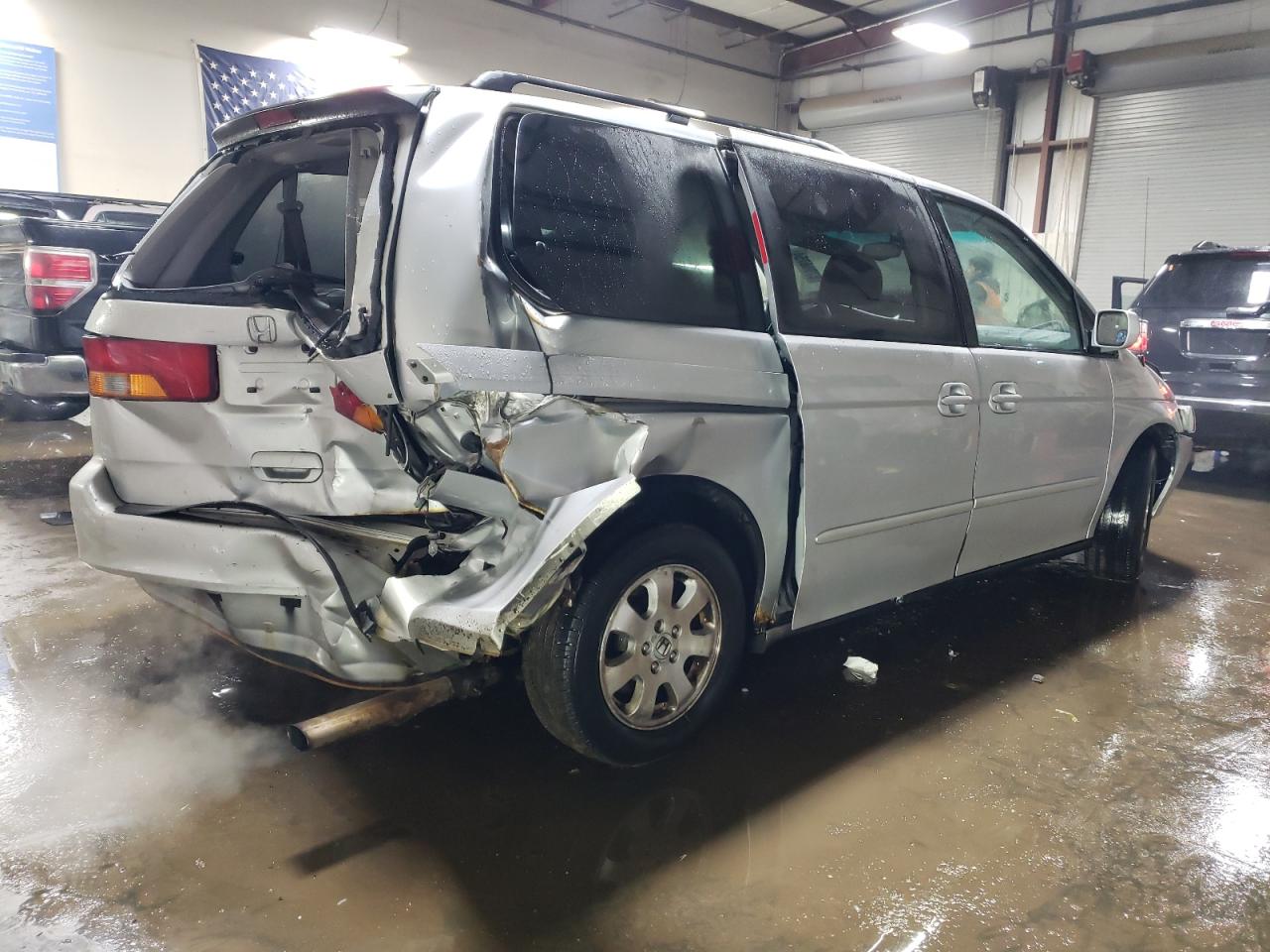 2004 Honda Odyssey VIN 5FNRL18034B058216 Copart auction photo, front end / rear end damage thumbnail 3