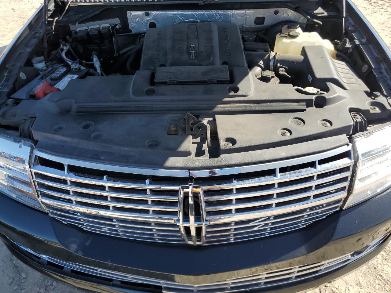 2014 Lincoln Navigator VIN 5LMJJ2H50EEL03327 Copart auction photo, rear end / side damage thumbnail 12