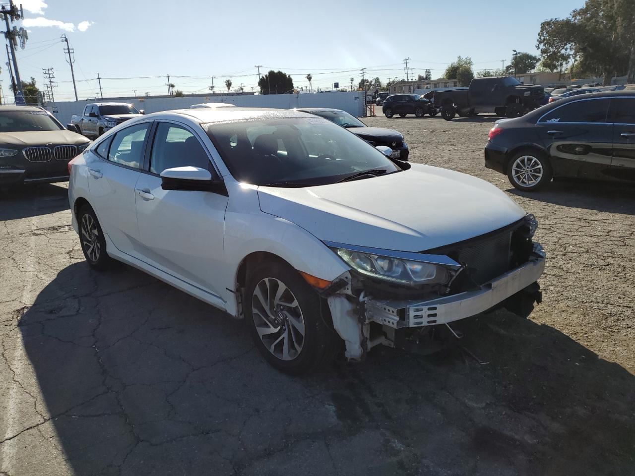 2017 Honda Civic VIN 2HGFC2F74HH516405 Copart auction photo, front end / minor dent/scratches damage thumbnail 4
