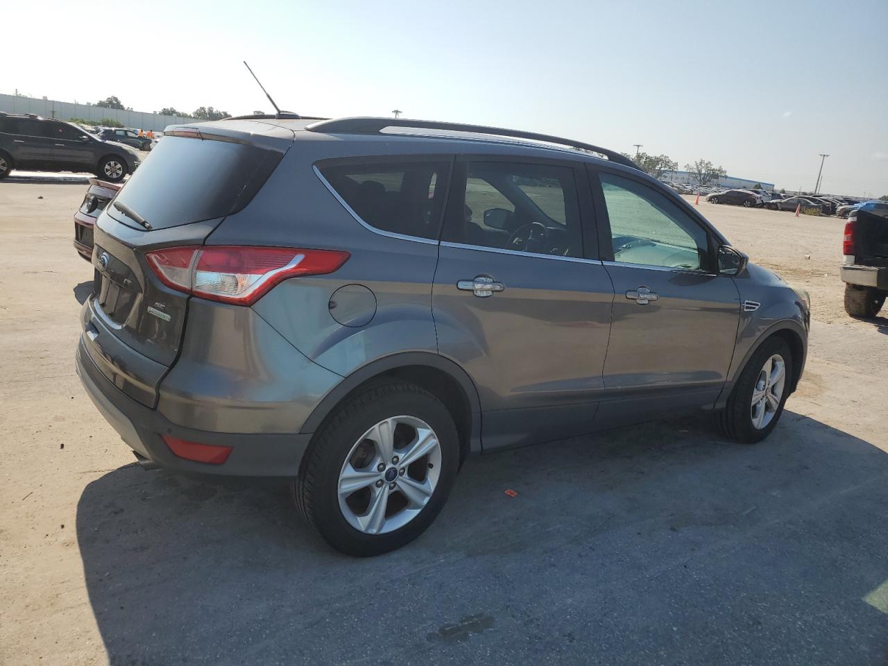 2014 Ford Escape VIN 1FMCU0GX4EUA98403 Copart auction photo, rear end / minor dent/scratches damage thumbnail 3