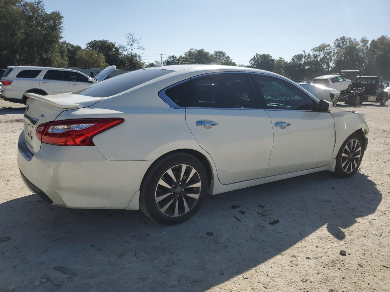 2016 Nissan Altima VIN 1N4AL3AP2GC273657 Copart auction photo, front end / minor dent/scratches damage thumbnail 3
