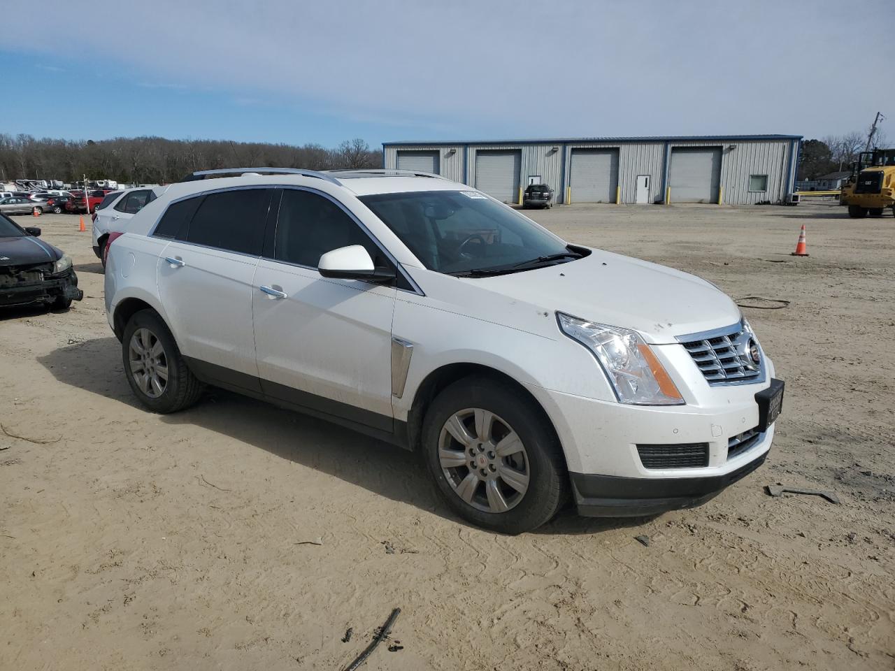 2016 Cadillac SRX VIN 3GYFNBE31GS535409 Copart auction photo, stripped damage thumbnail 4
