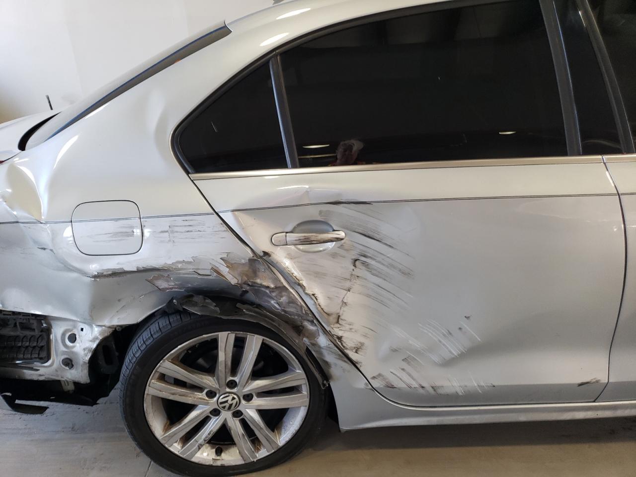 2015 Volkswagen Jetta VIN 3VWL17AJ0FM334493 Copart auction photo, side / rear end damage thumbnail 10