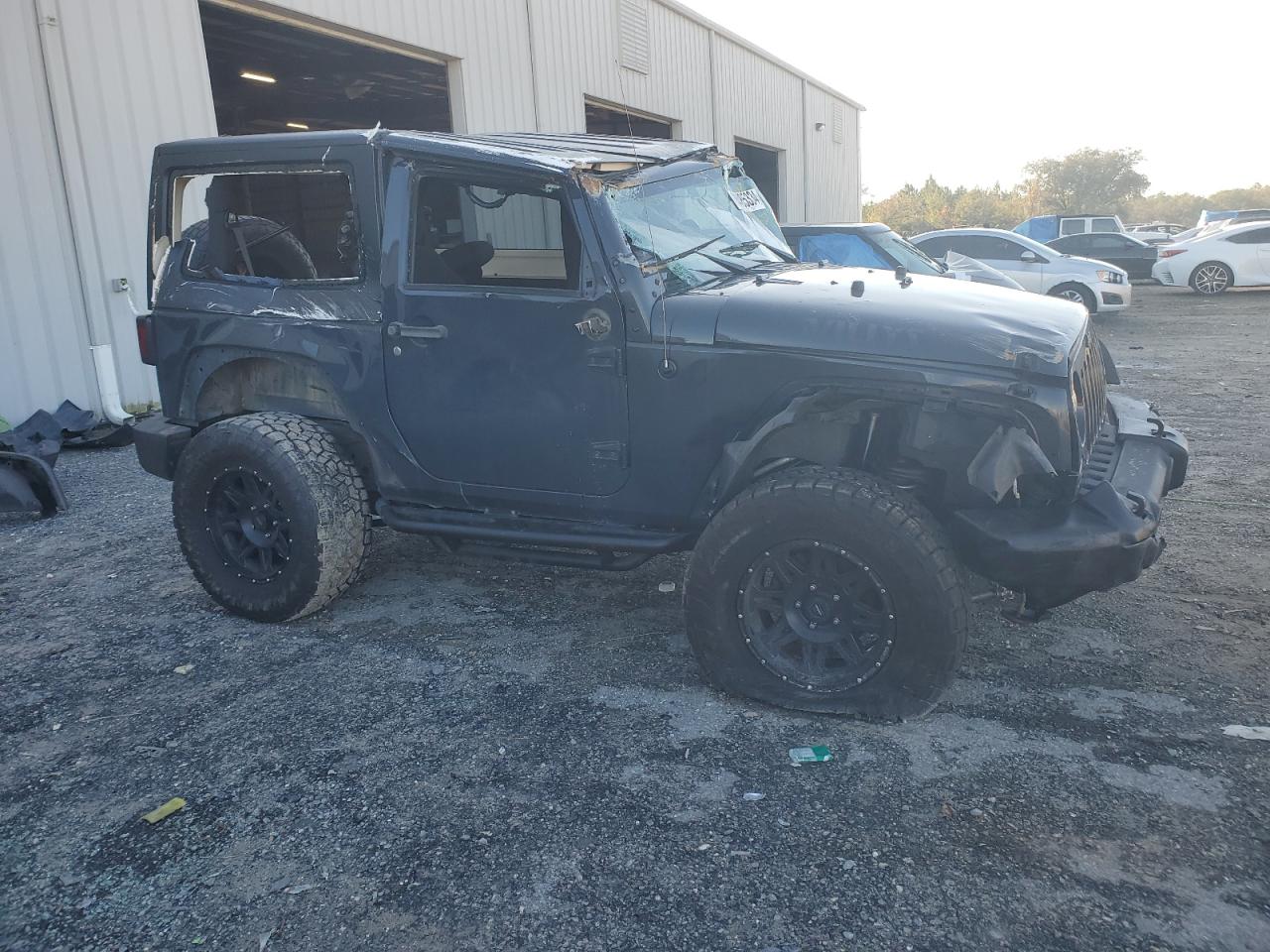 2017 Jeep Wrangler VIN 1C4AJWAG3HL603471 Copart auction photo, all over damage thumbnail 4