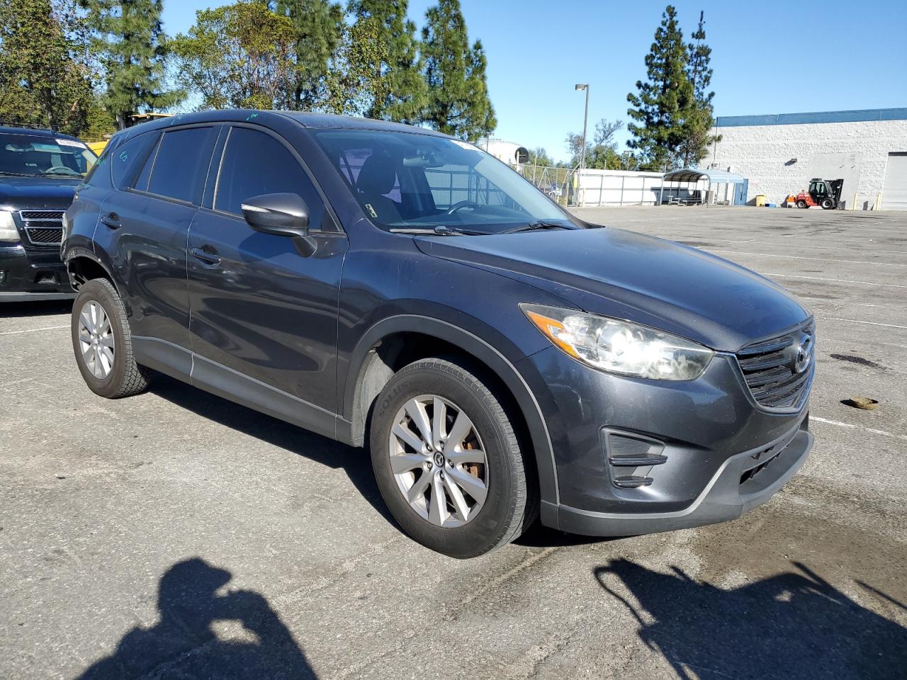 2016 Mazda CX-5 VIN JM3KE2BY6G0798644 Copart auction photo, rear end damage thumbnail 4