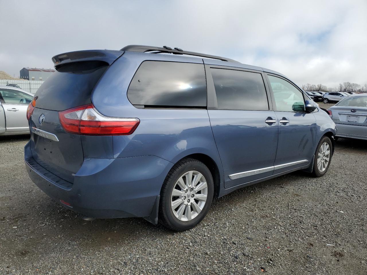 2015 Toyota Sienna VIN 5TDYK3DC1FS629808 Copart auction photo, front end damage thumbnail 3