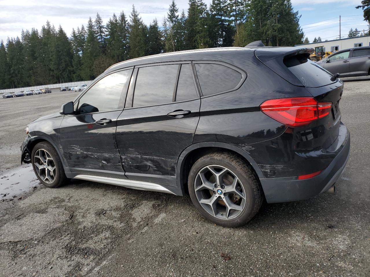 2016 BMW X1 VIN WBXHT3C39GP883831 Copart auction photo, front end / side damage thumbnail 2