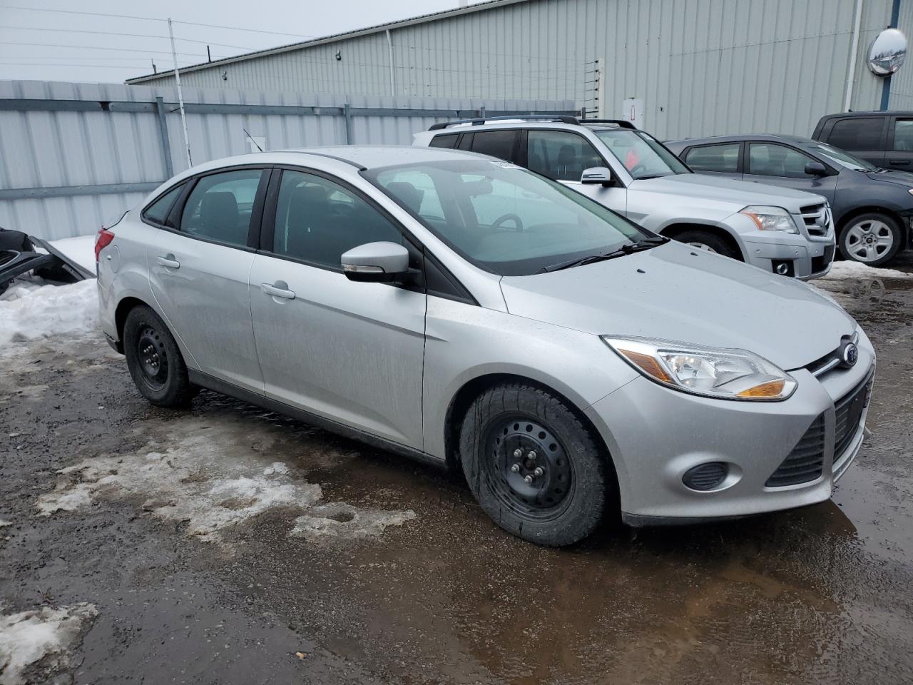 2014 Ford Focus VIN 1FADP3F2XEL273594 Copart auction photo, rear end damage thumbnail 4