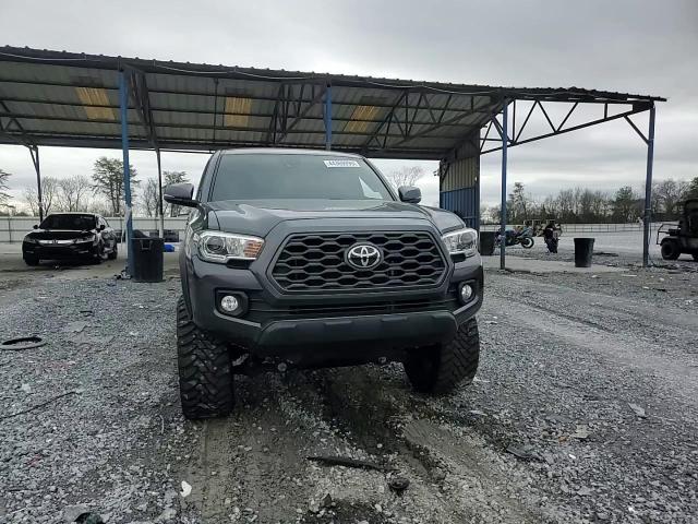 2021 Toyota Tacoma VIN 3TMCZ5AN9MM443907 Copart auction photo, side damage thumbnail 11