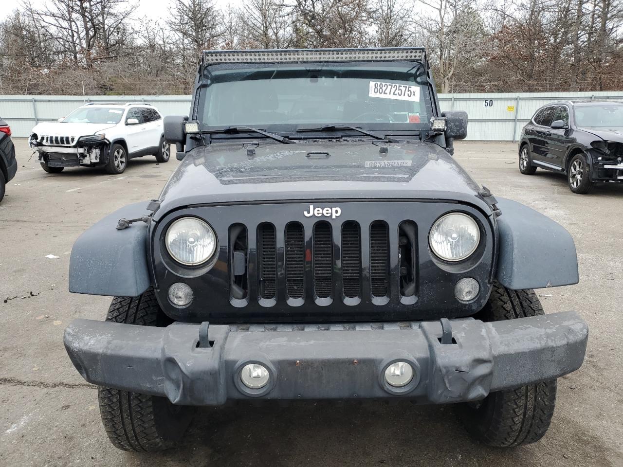 2014 Jeep Wrangler VIN 1C4GJWAG5EL216023 Copart auction photo, stripped / front end damage thumbnail 5