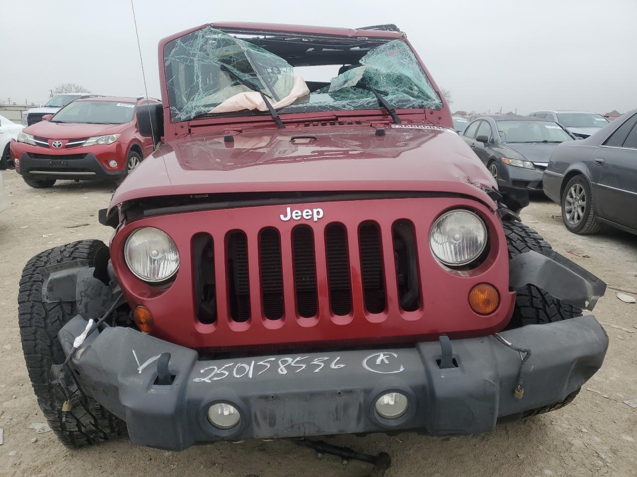 2012 Jeep Wrangler VIN 1C4BJWDG8CL284030 Copart auction photo, all over damage thumbnail 5