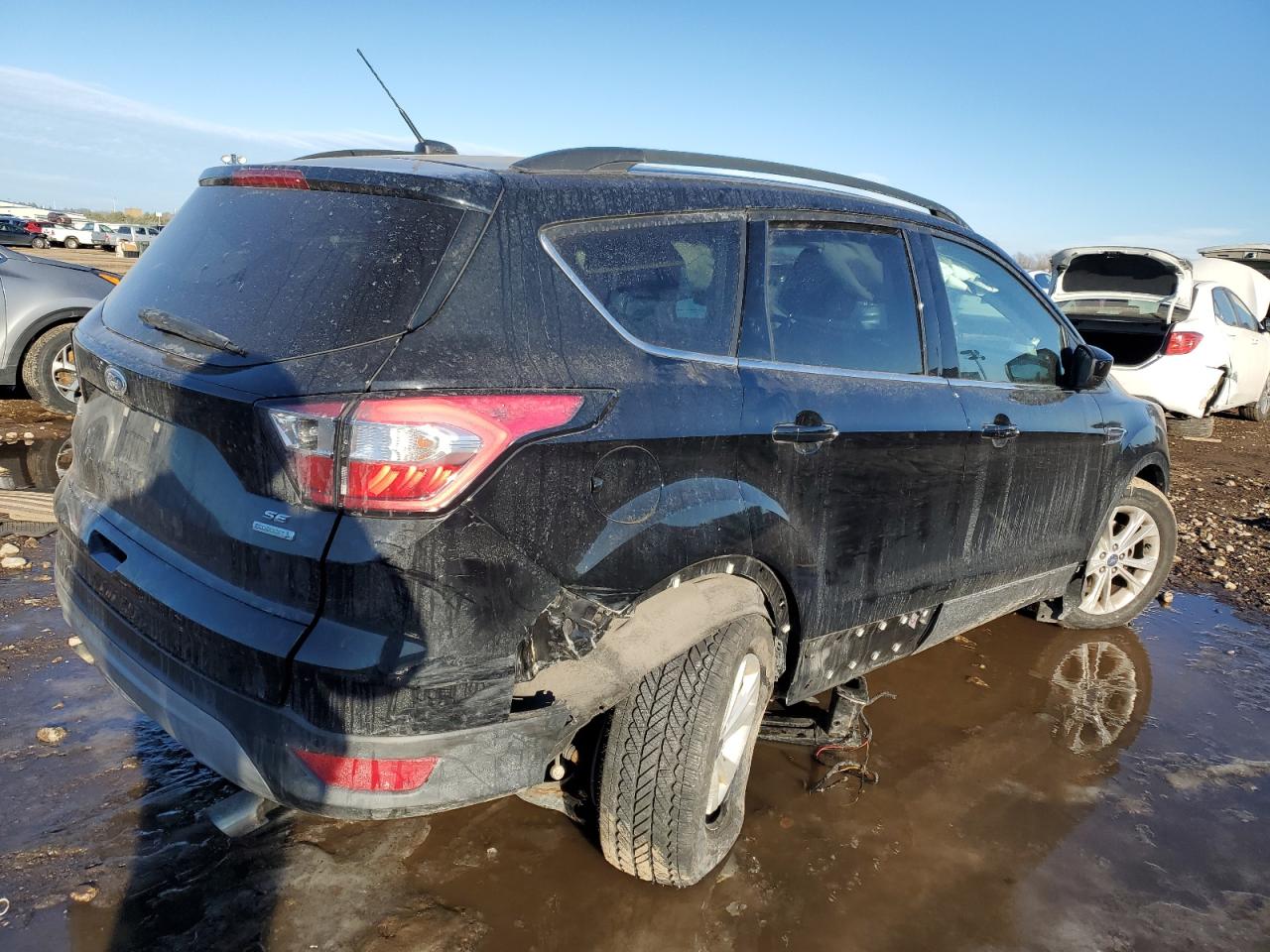 2017 Ford Escape VIN 1FMCU0GD7HUD36111 Copart auction photo, side / rear end damage thumbnail 3