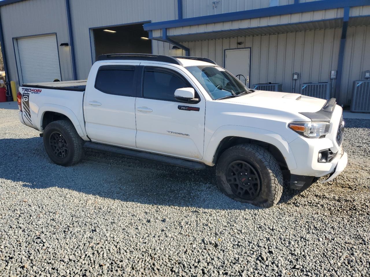 2018 Toyota Tacoma VIN 5TFCZ5AN0JX163881 Copart auction photo, all over damage thumbnail 4