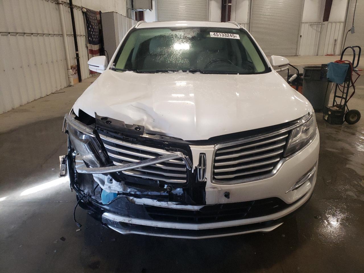 2015 Lincoln MKZ VIN 5LMTJ2AH5FUJ15147 Copart auction photo, front end / side damage thumbnail 5