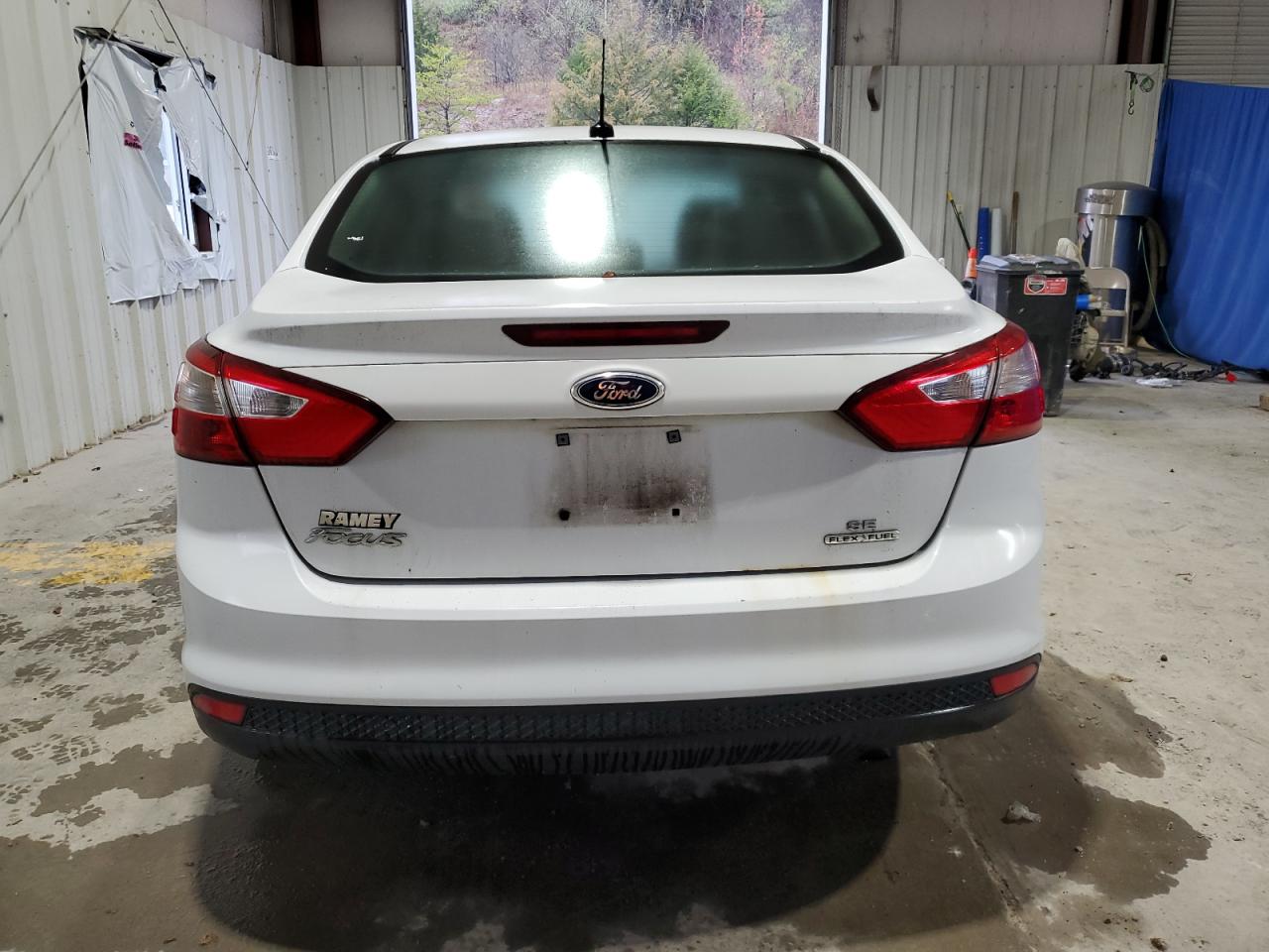 2014 Ford Focus VIN 1FADP3F22EL324778 Copart auction photo, minor dent/scratches damage thumbnail 6