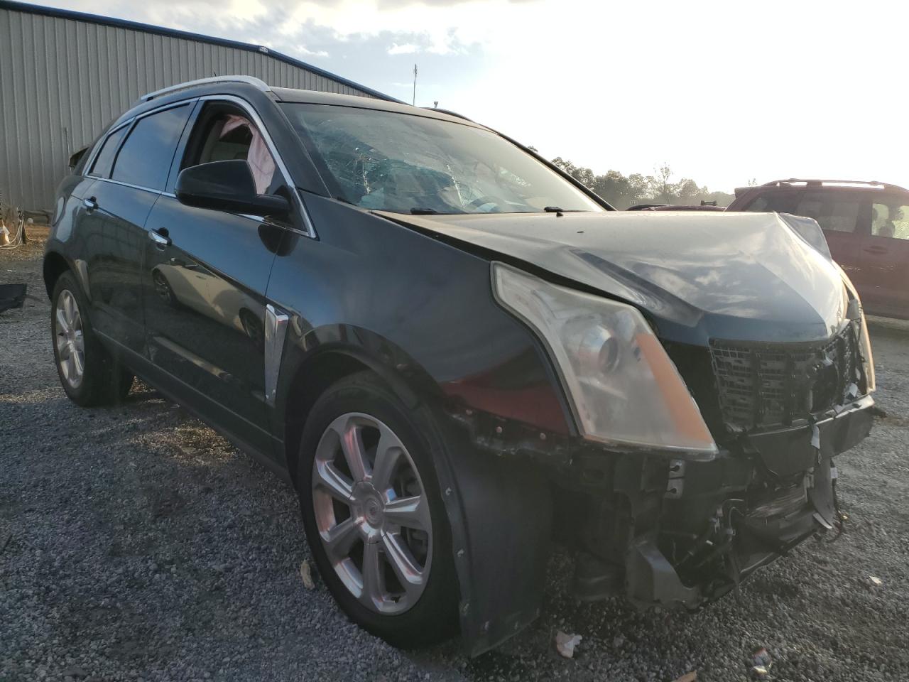 2015 Cadillac SRX VIN 3GYFNDE36FS579903 Copart auction photo, side / minor dent/scratches damage thumbnail 4