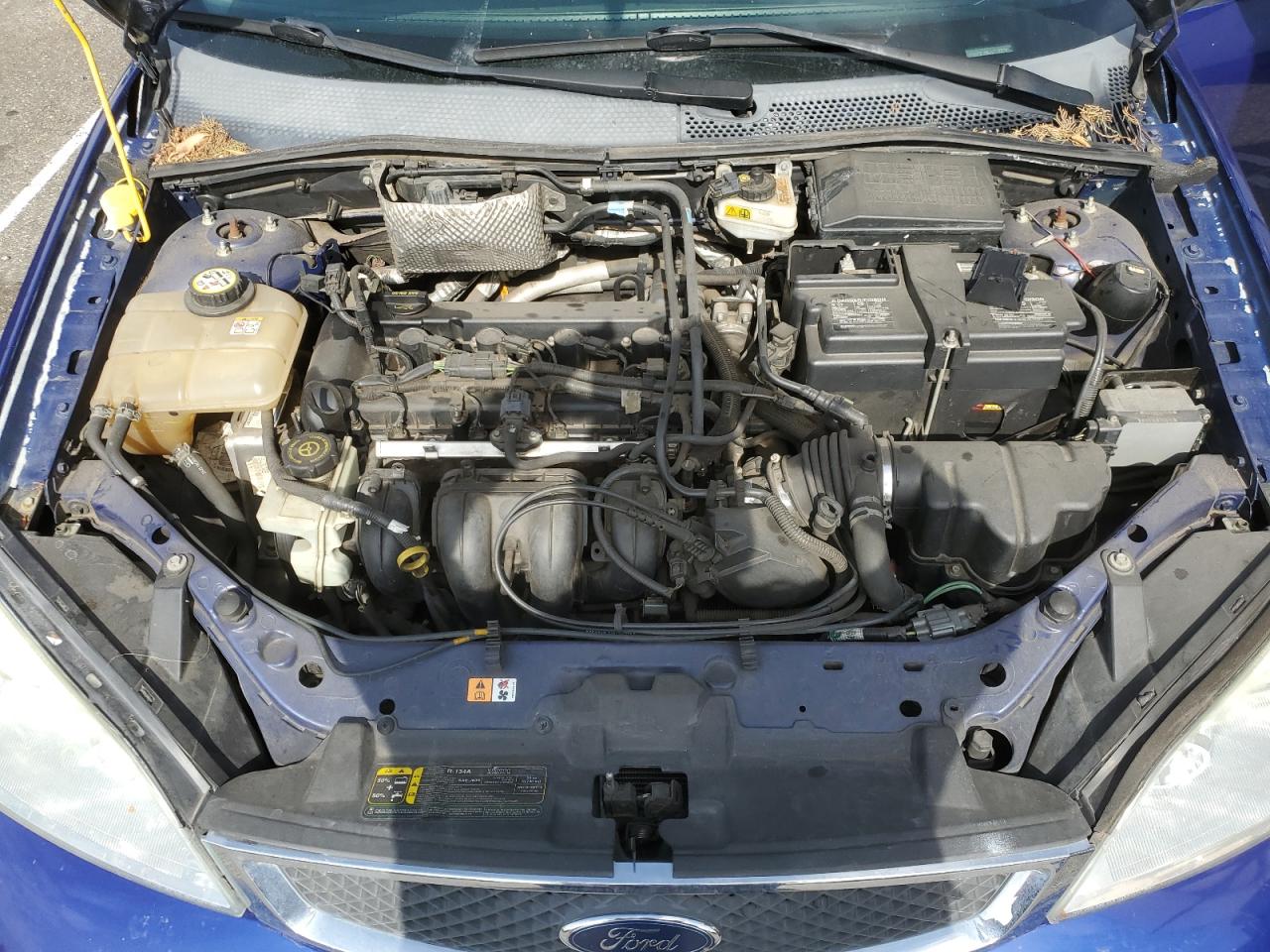 2006 Ford Focus VIN 1FAHP31N86W215325 Copart auction photo, undercarriage / side damage thumbnail 11