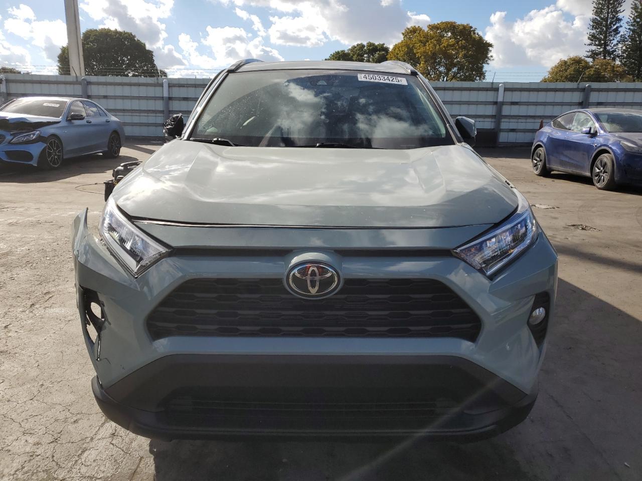 2021 Toyota RAV 4 VIN 2T3C1RFV4MW132181 Copart auction photo, front end / side damage thumbnail 5