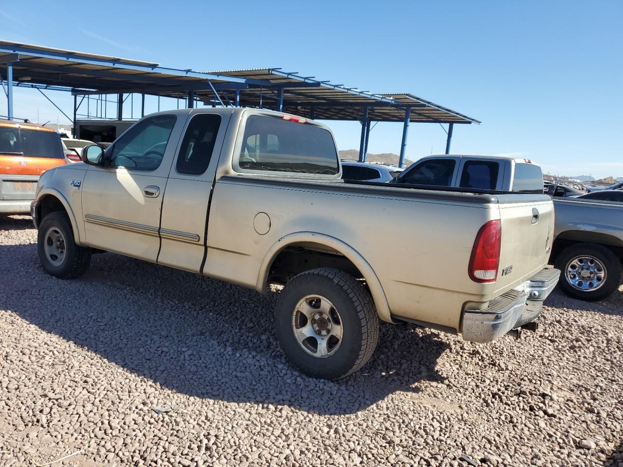 1999 Ford F-150 VIN 2FTRX18L1XCA21305 Copart auction photo, minor dent/scratches damage thumbnail 2