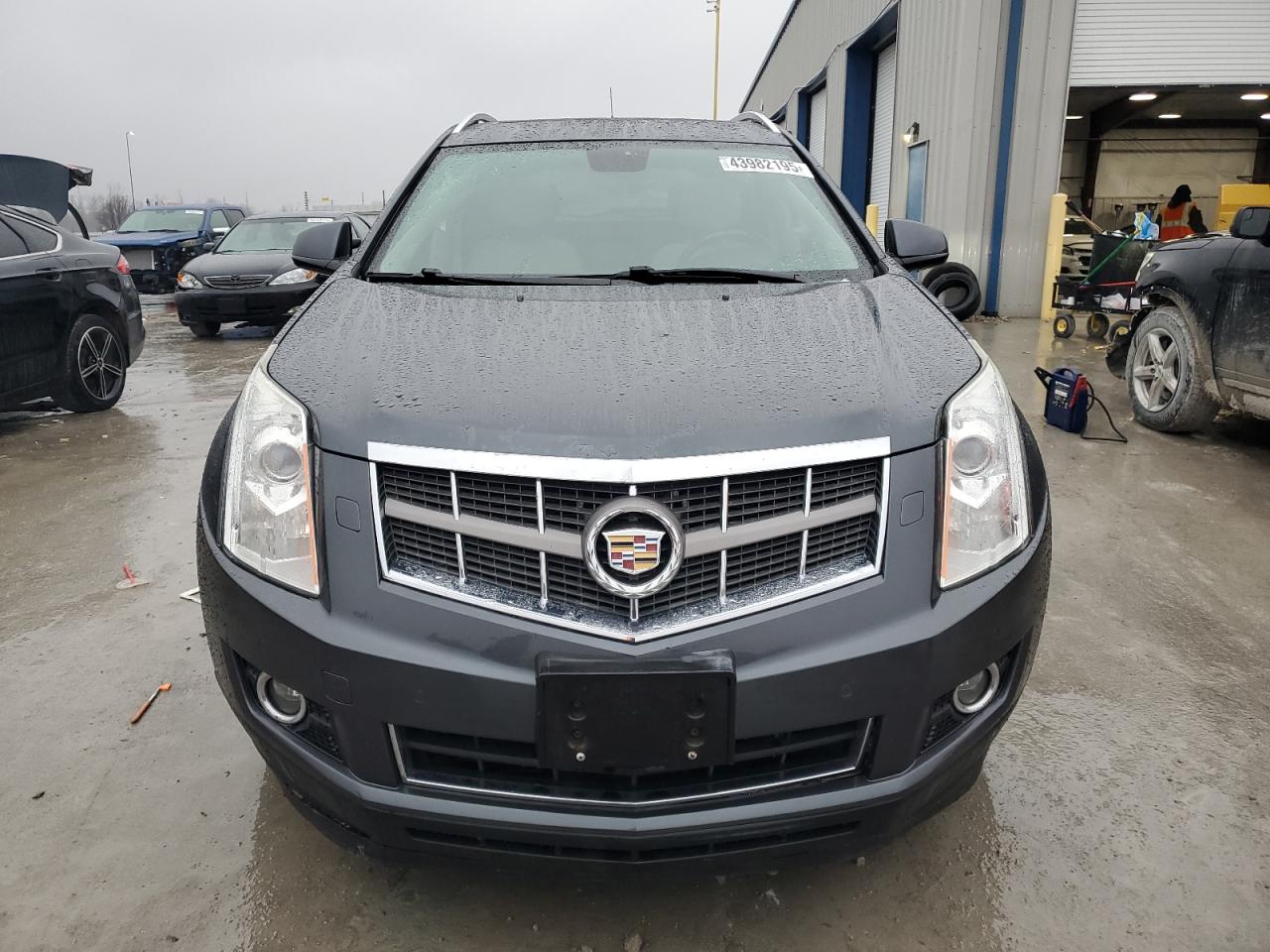 2010 Cadillac SRX VIN 3GYFNBEY8AS596386 Copart auction photo, side damage thumbnail 5