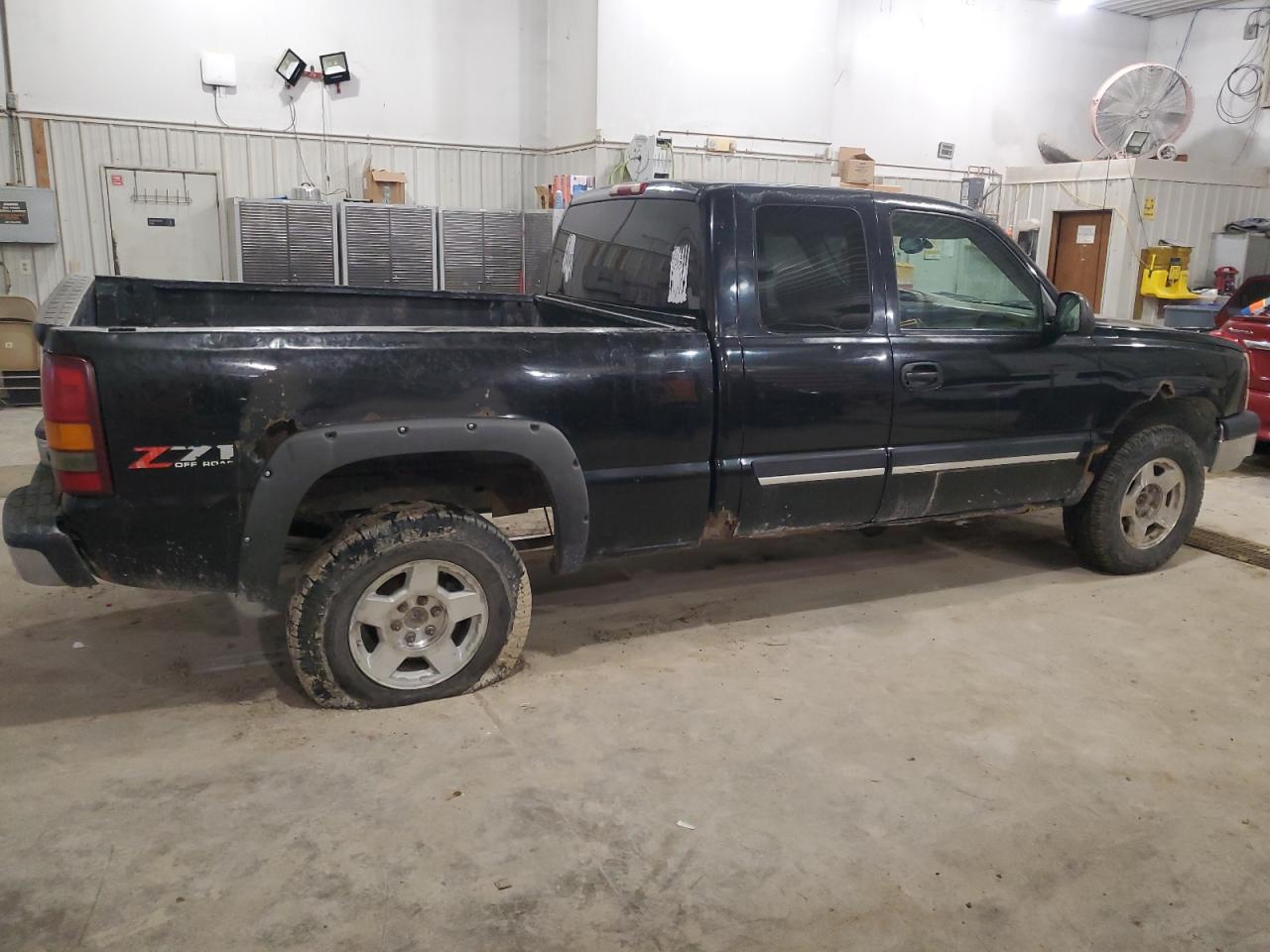 2003 Chevrolet Silverado VIN 2GCEK19T831100097 Copart auction photo, undercarriage damage thumbnail 3