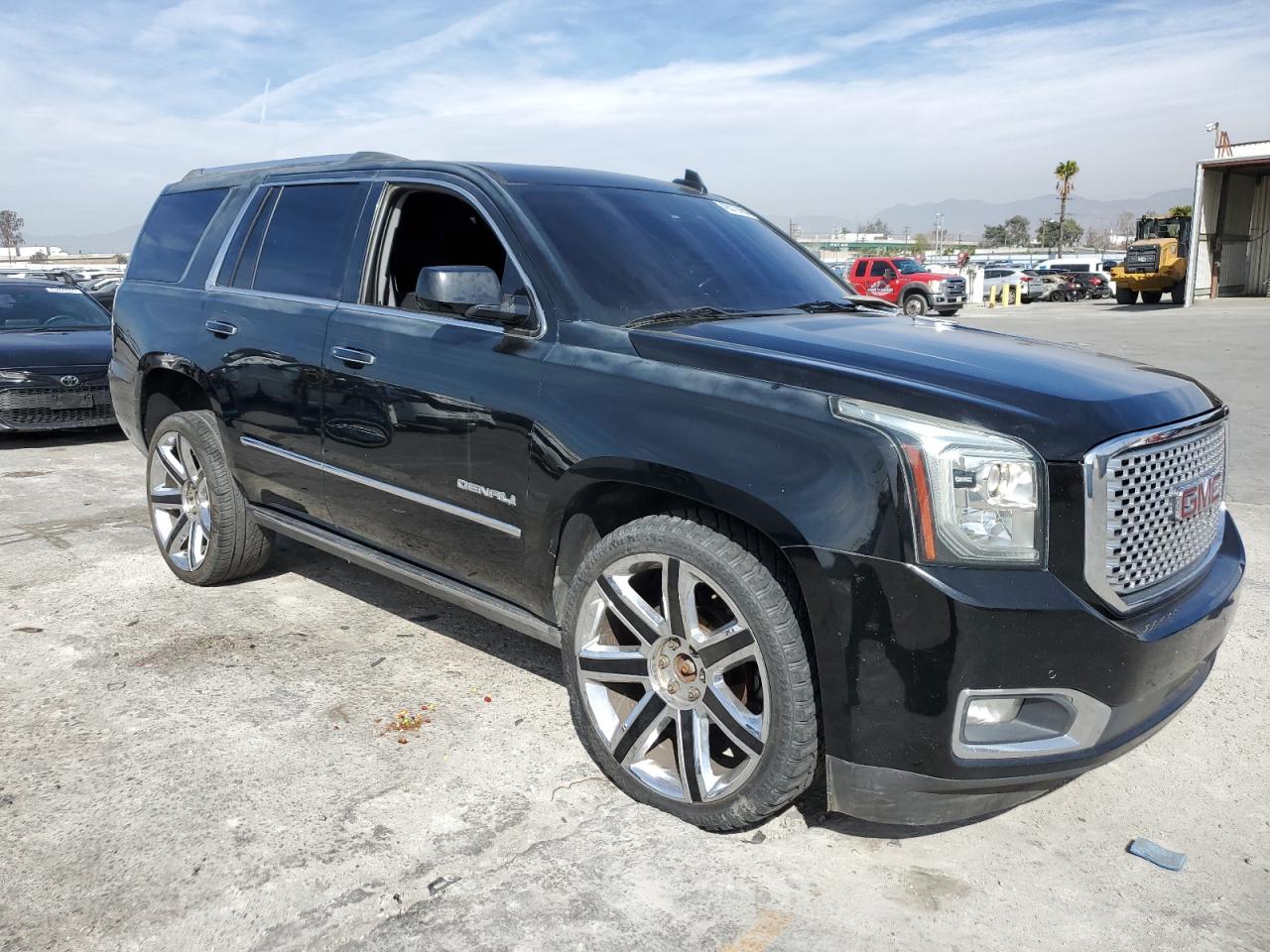 2015 GMC Yukon VIN 1GKS2CKJ0FR555789 Copart auction photo, side / front end damage thumbnail 4