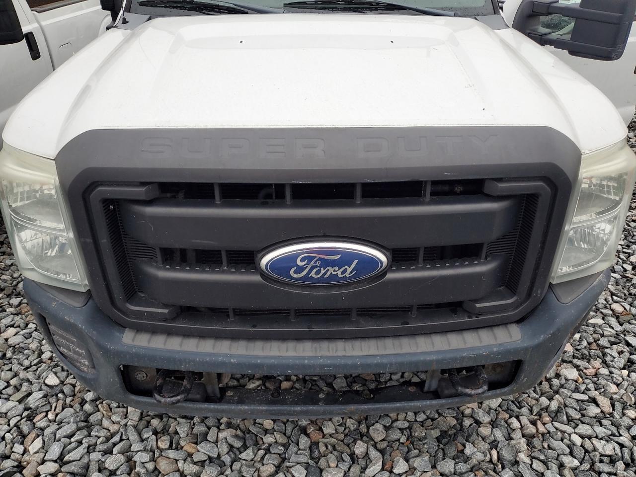 2012 Ford F250 VIN 1FTBF2A67CEA50777 Copart auction photo, minor dent/scratches damage thumbnail 7