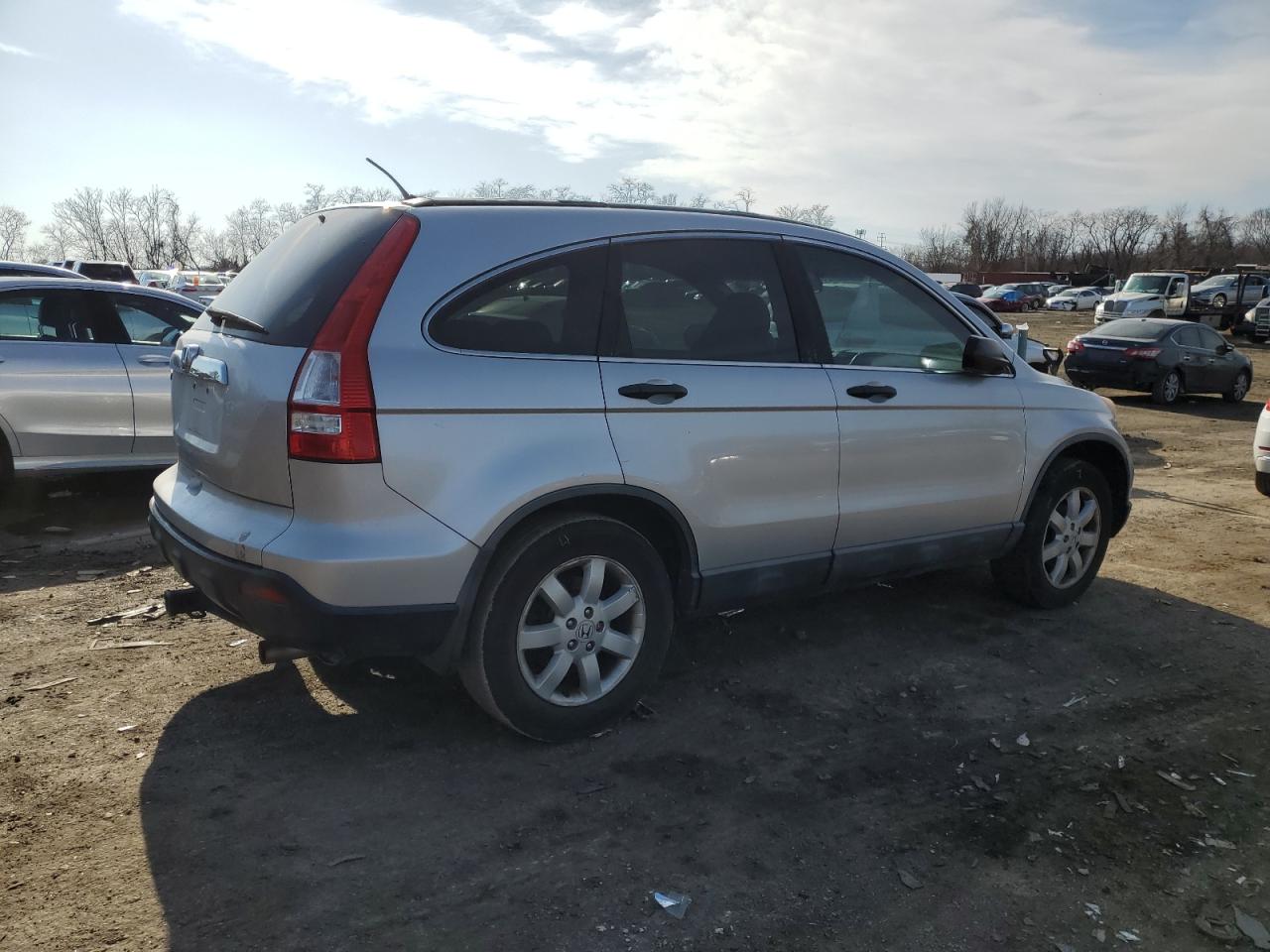 2009 Honda CR-V VIN 5J6RE48569L044896 Copart auction photo, side / minor dent/scratches damage thumbnail 3