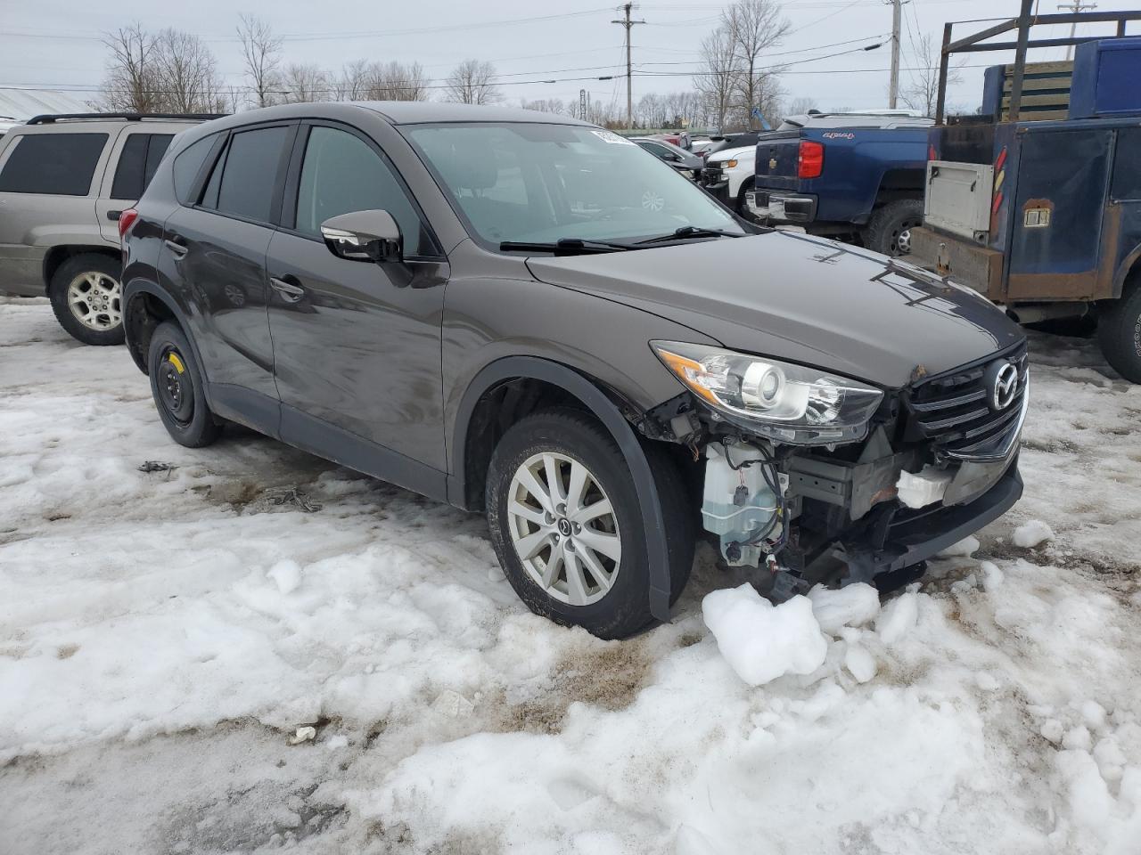 2016 Mazda CX-5 VIN JM3KE4CY7G0745865 Copart auction photo, front end / minor dent/scratches damage thumbnail 4