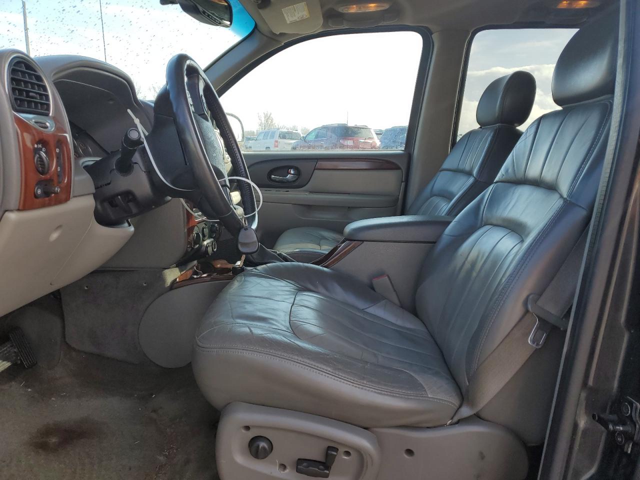 2004 GMC Envoy VIN 1GKET16P646147809 Copart auction photo, rear end / minor dent/scratches damage thumbnail 7