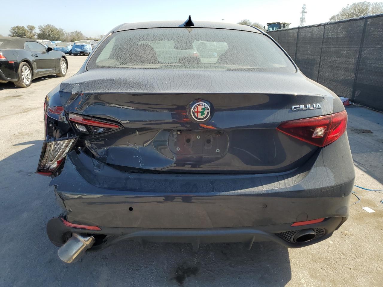 2019 Alfa Romeo Giulia VIN ZARFAMBN1K7600825 Copart auction photo, rear end damage thumbnail 6