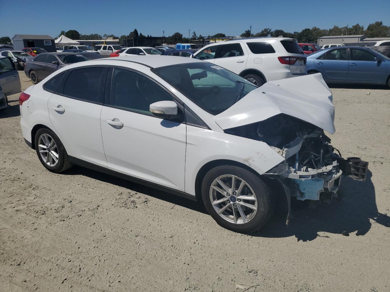 2015 Ford Focus VIN 1FADP3F24FL300807 Copart auction photo, front end damage thumbnail 4