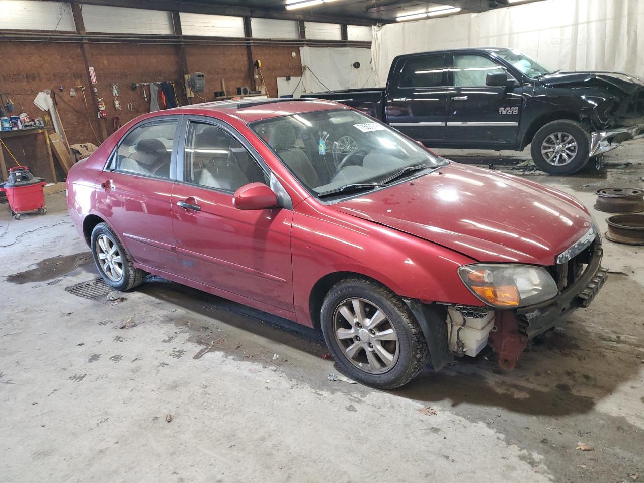 2009 KIA Spectra VIN KNAFE222495664515 Copart auction photo, front end damage thumbnail 4