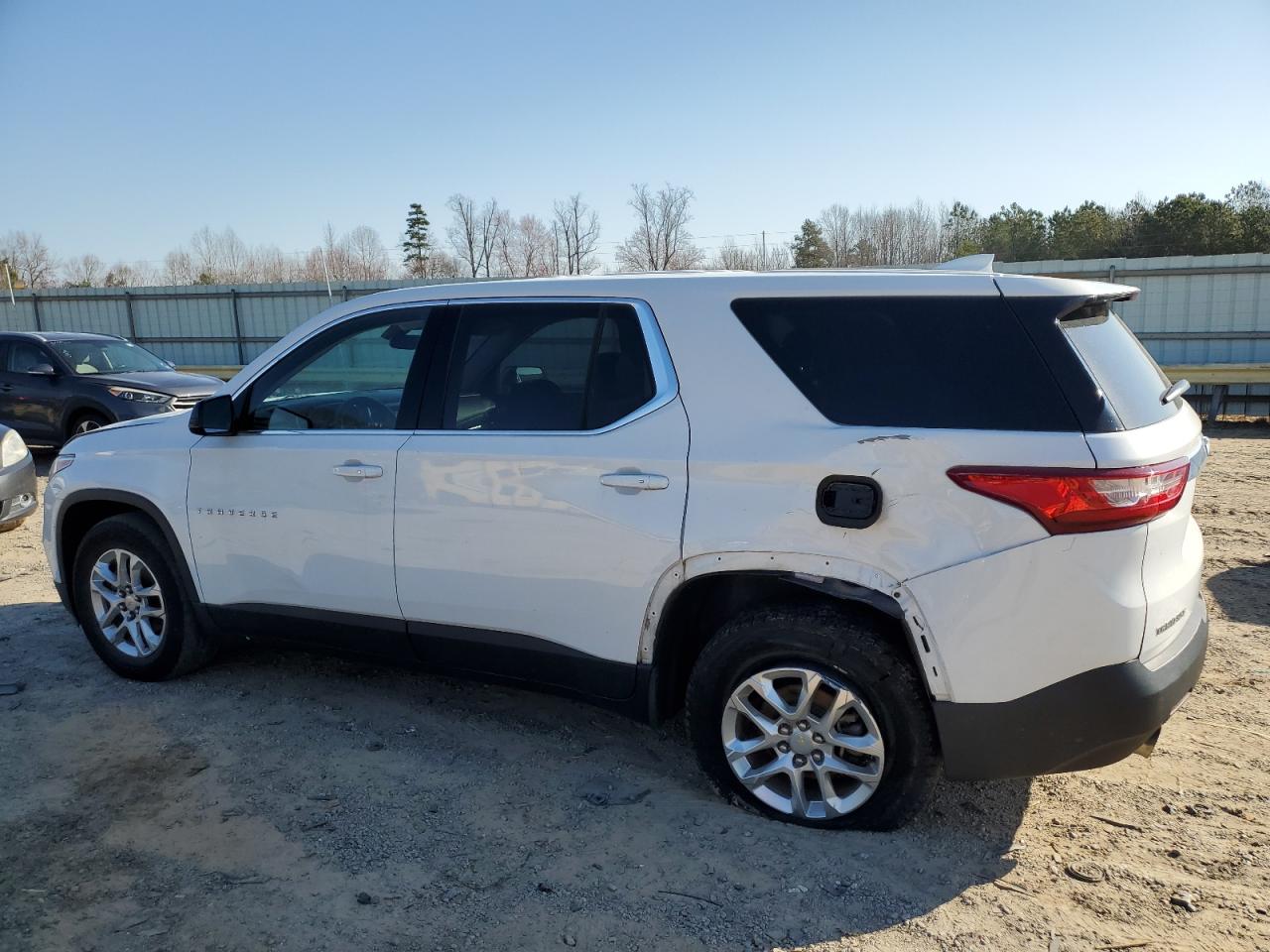 2018 Chevrolet Traverse VIN 1GNERFKW2JJ282581 Copart auction photo, side / rear end damage thumbnail 2