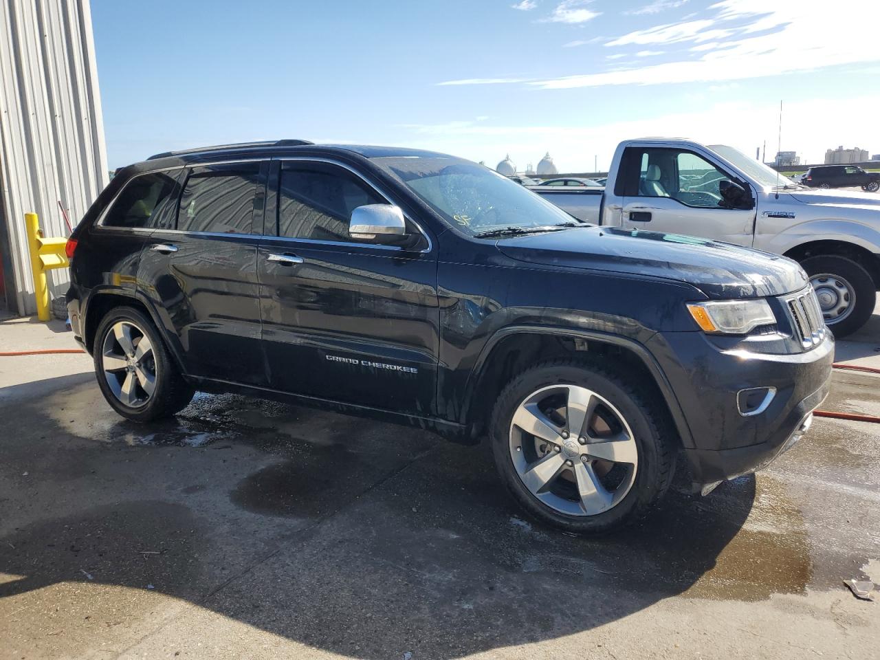 2016 Jeep Grand Cherokee VIN 1C4RJFCG8GC450505 Copart auction photo, rear end / side damage thumbnail 4