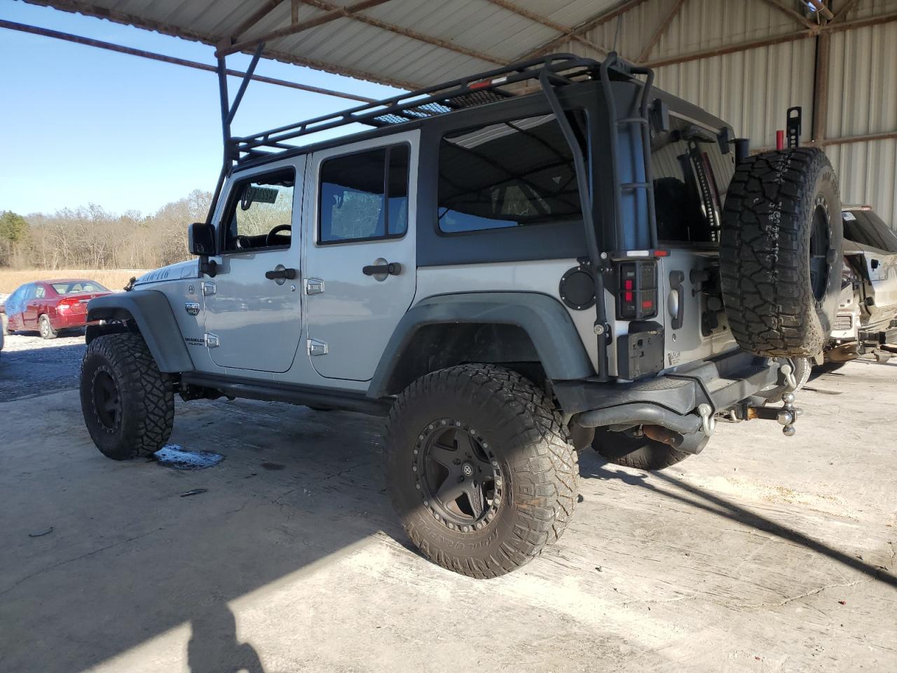 2012 Jeep Wrangler VIN 1C4BJWFG9CL230961 Copart auction photo, undercarriage / front end damage thumbnail 2