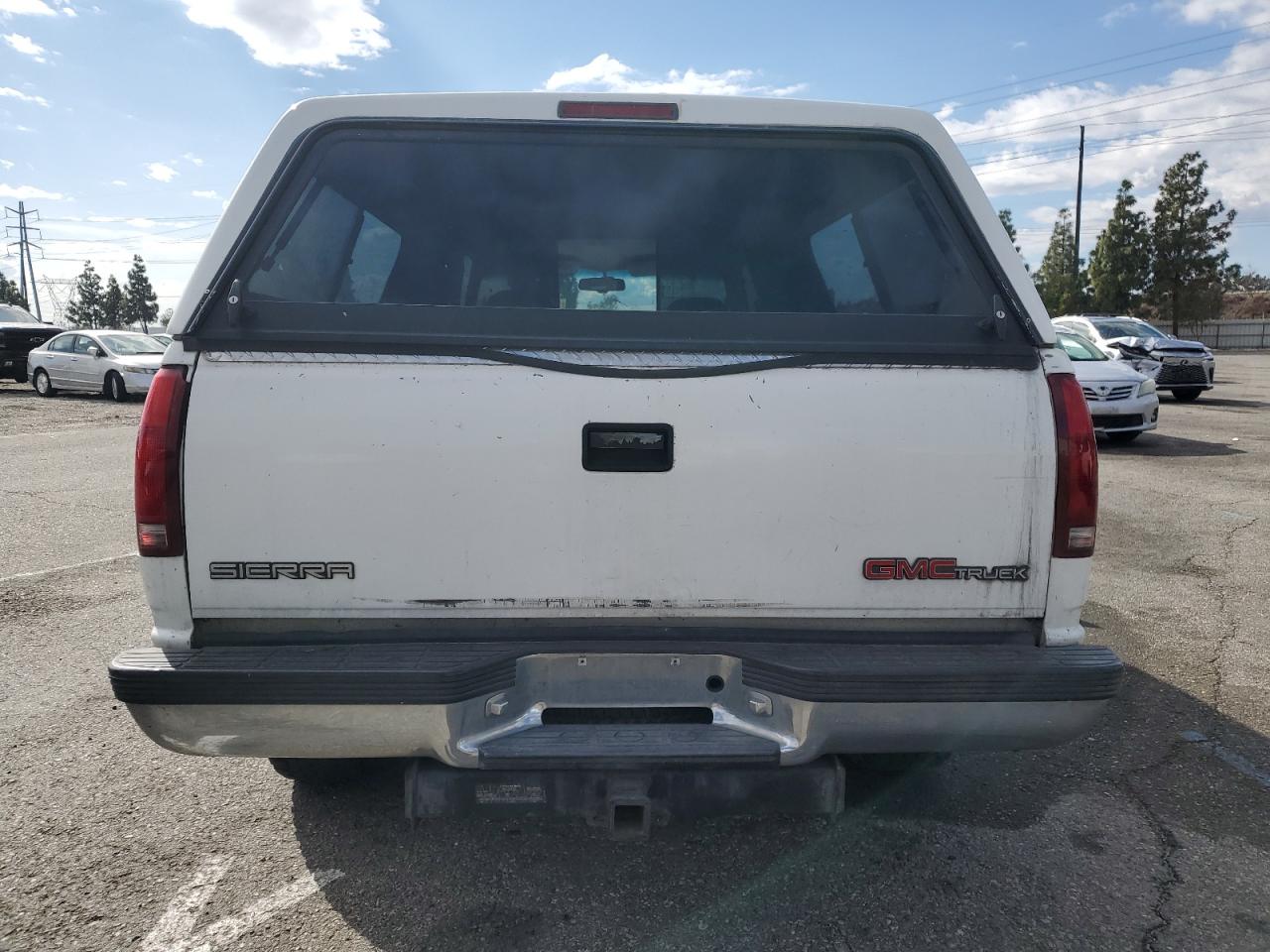 1996 GMC Sierra VIN 2GTEC19R3T1538561 Copart auction photo, side damage thumbnail 6
