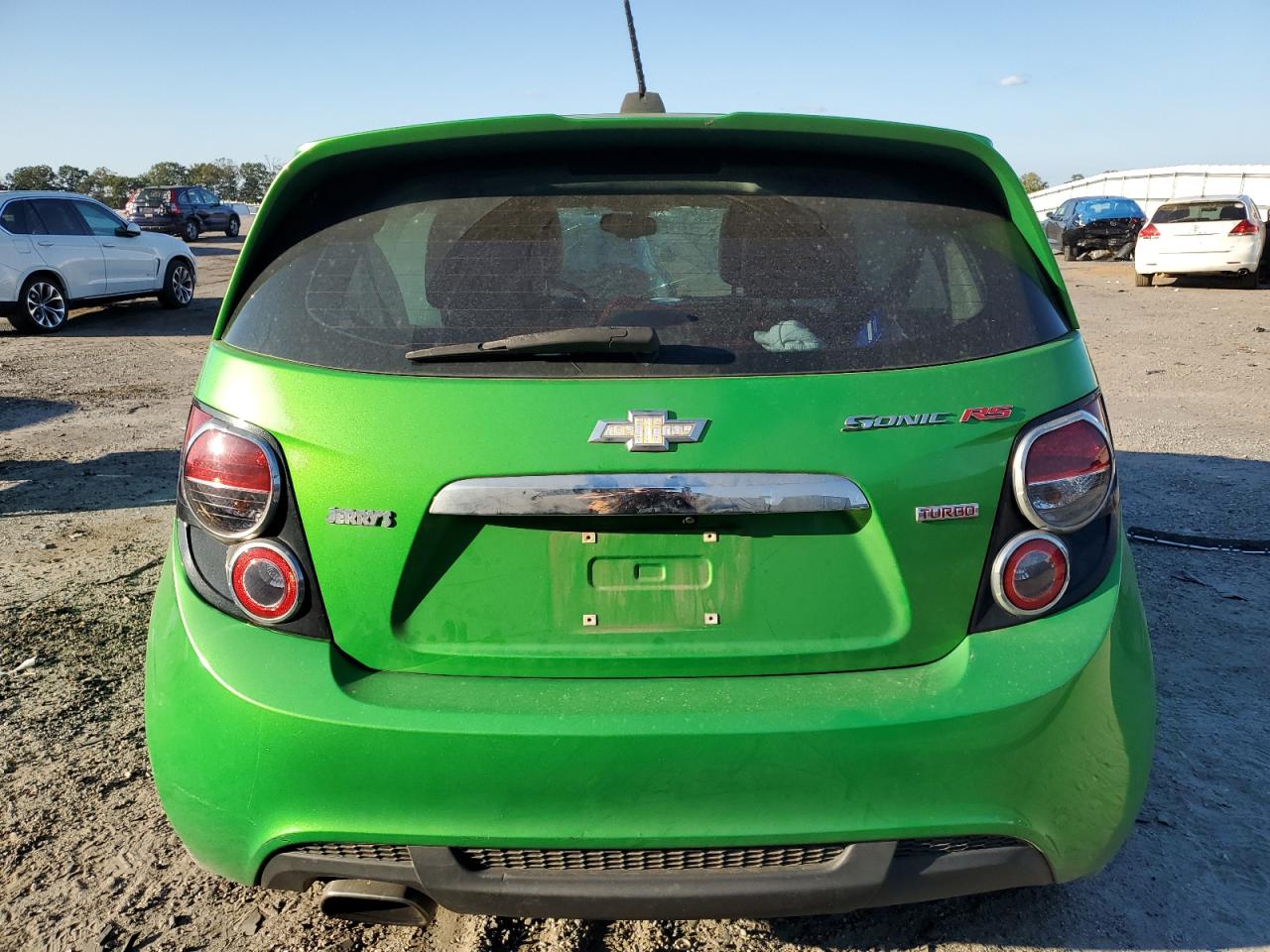 2015 Chevrolet Sonic VIN 1G1JG6SBXF4161497 Copart auction photo, all over damage thumbnail 6