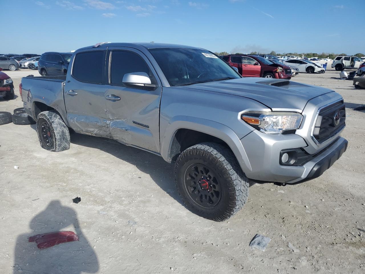 2021 Toyota Tacoma VIN 5TFAZ5CN5MX110649 Copart auction photo, side damage thumbnail 4