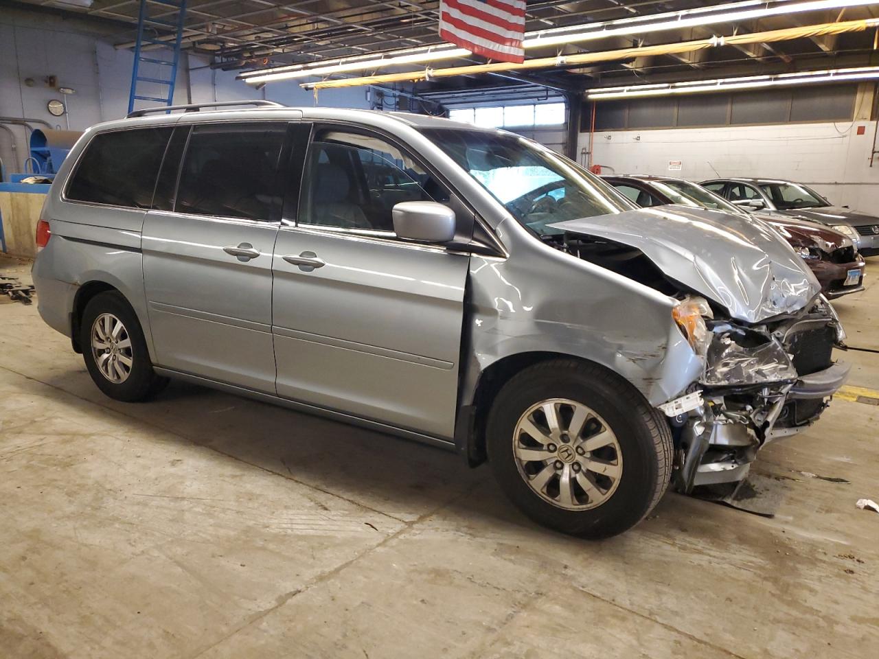 2010 Honda Odyssey VIN 5FNRL3H75AB045990 Copart auction photo, front end / minor dent/scratches damage thumbnail 4