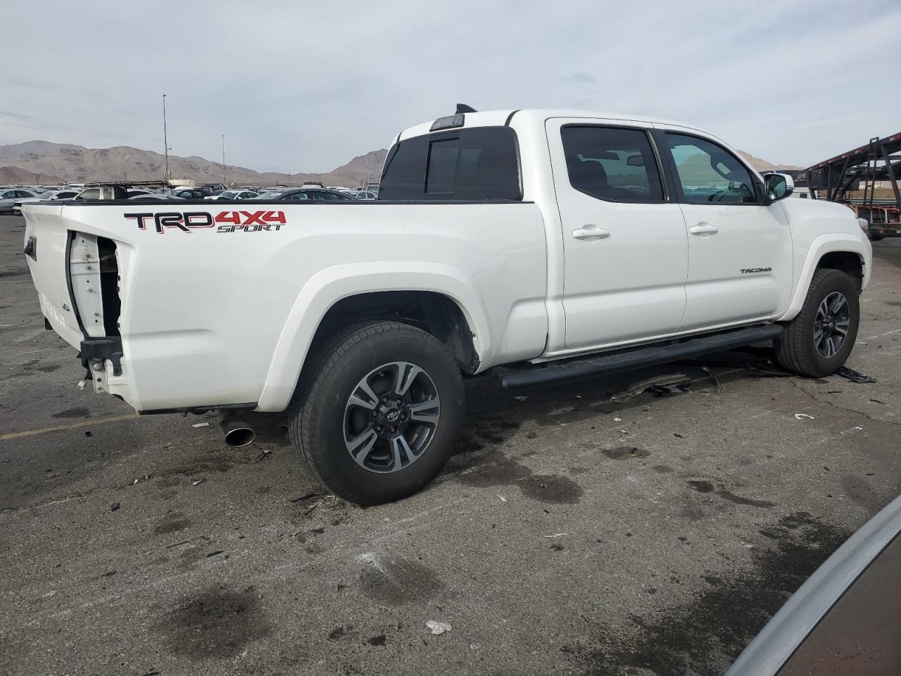 2017 Toyota Tacoma VIN 3TMDZ5BN4HM028065 Copart auction photo, rear end damage thumbnail 3