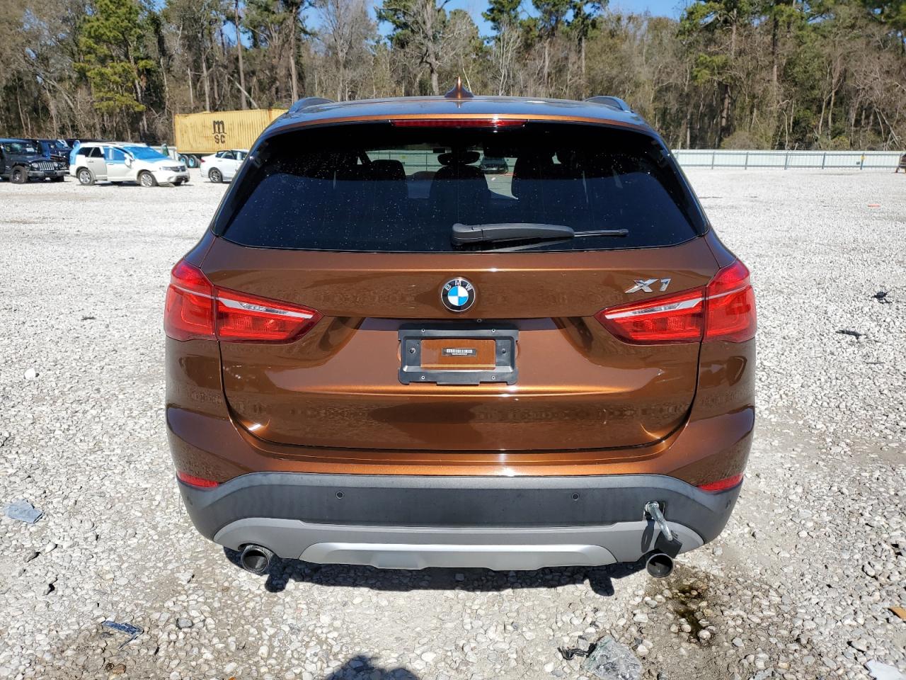 2016 BMW X1 VIN WBXHT3C3XGP883224 Copart auction photo, front end / side damage thumbnail 6