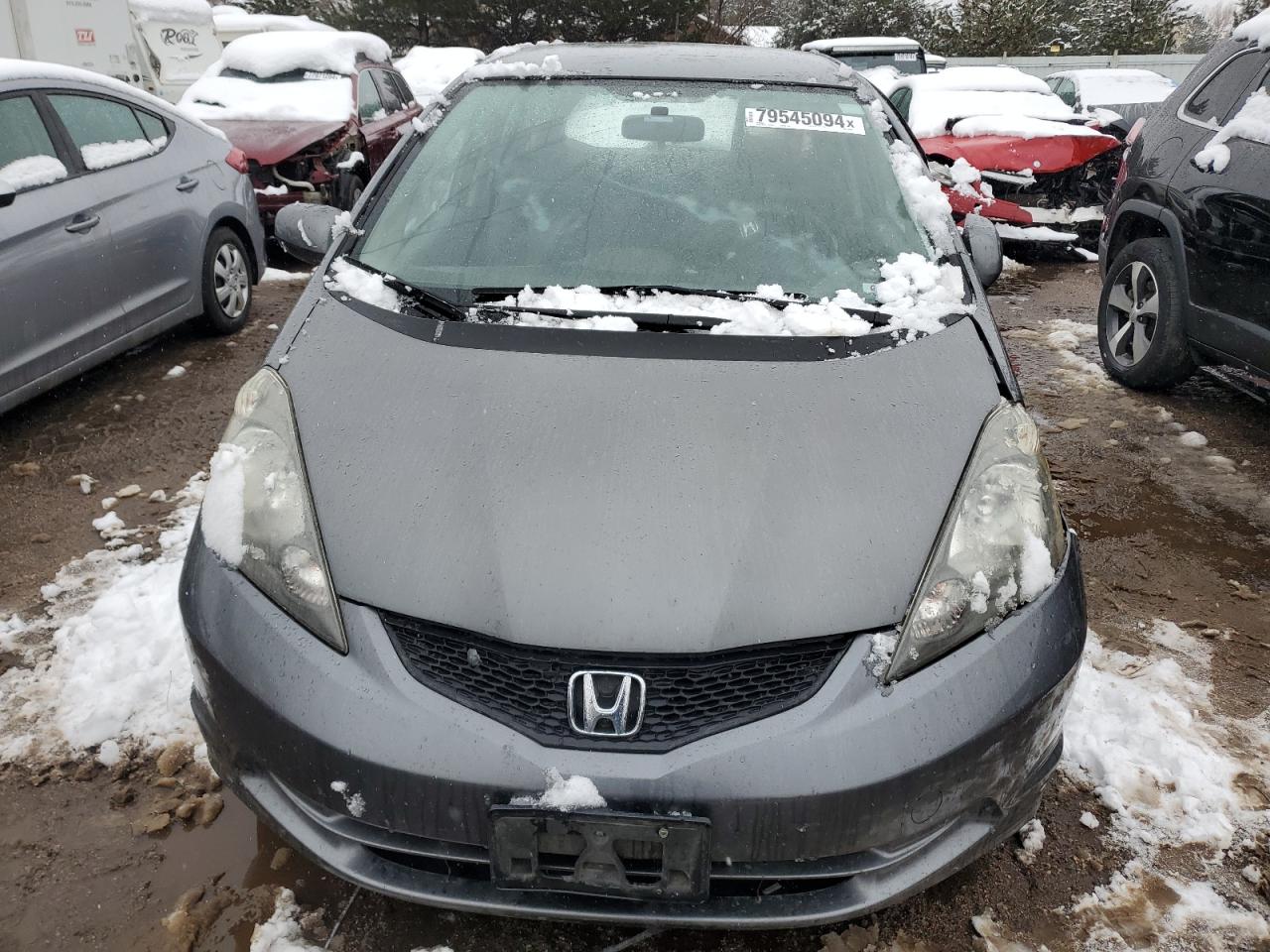 2012 Honda Fit VIN JHMGE8H38CC020298 Copart auction photo, front end / side damage thumbnail 5
