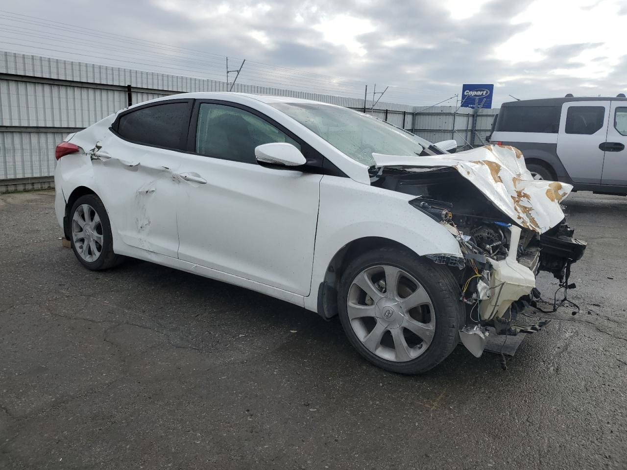 2012 Hyundai Elantra VIN 5NPDH4AE2CH105979 Copart auction photo, all over damage thumbnail 4